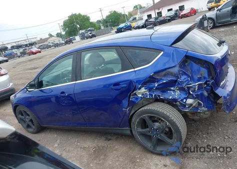 2012 Ford Focus Titanium z USA, uszkodzony, nr VIN 1FAHP3N24CL283473